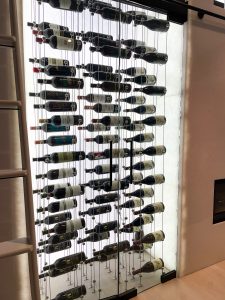 Cable Wine Racks in a Small Modern Wine Closet with LED Backlighting