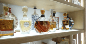 Lighted shelf made from acrylic LED panel in wine cellar.
