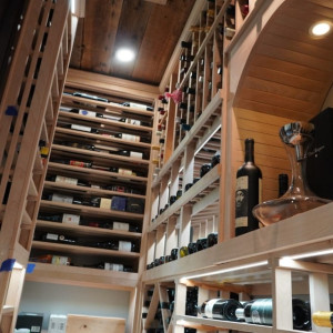 76 - Walk in Miami Florida wine room with custom wood wine racks