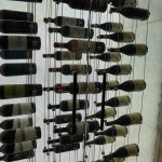 This incredible wine collection is securely protected and displayed in these modern cable wine racks.