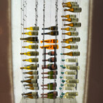 These bottles look incredible, illuminated by the modern wine cellar LED lighting backpanels.