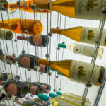 Cable wine racks can hold bottles of many different sizes and shapes.