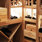High reveal racks display bottles in a slightly inclined position, imitating how sommeliers present their wines to their customers. We fixed LED ribbon lights in all high reveal racks so the owners could read the bottle labels a lot faster.