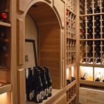 When you step inside this wine cellar, you'll hear nothing from the air conditioning unit. A quiet wine cooling system is important to keep the wines within the wooden wine racks protected from vibrations.