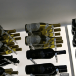 Glass wine rooms means every corner inside is apparent. That's why we plan all the details meticulously like building the racks to the ceiling to reduce negative spaces.