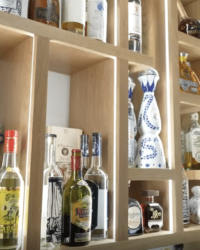 11 - Channels were carved into each compartments to make room for the modern LED light strips in this wine cellar. Custom modern wine cellar lights
