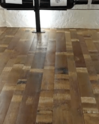 13 - These are repurposed wine barrel staves carefully cut and flattened for this custom modern wine cellar. Custom Modern Wine Cellar Repurposed Wine Barrel Flooring