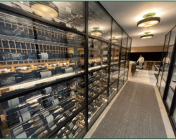2 - The entire modern glass wine cellar's collection can be fully viewed from the outside.